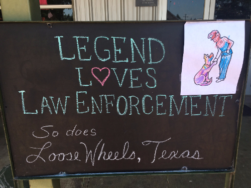 Image of chalk board saying, "Legend Loves Law Enforcement so does Loose Wheels, Texas"